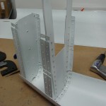 Aft bulkheads riveted to tailcone skin
