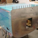 Firewall drilled to fuselage
