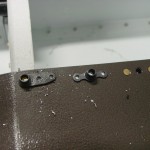 Installing flap bearing block nutplates