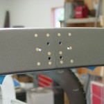 Rear bow splice plate rivets