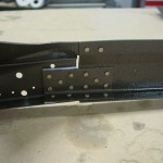 Splice plate riveting